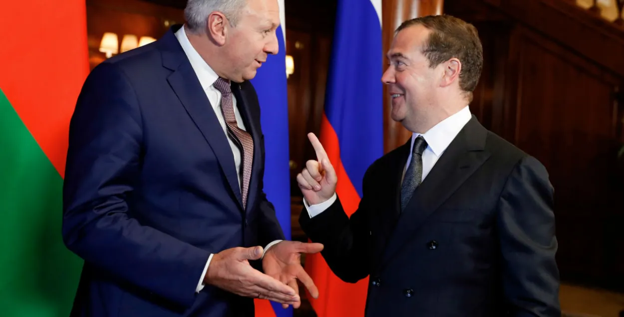 Сергей Румас и Дмитрий Медведев / Reuters
