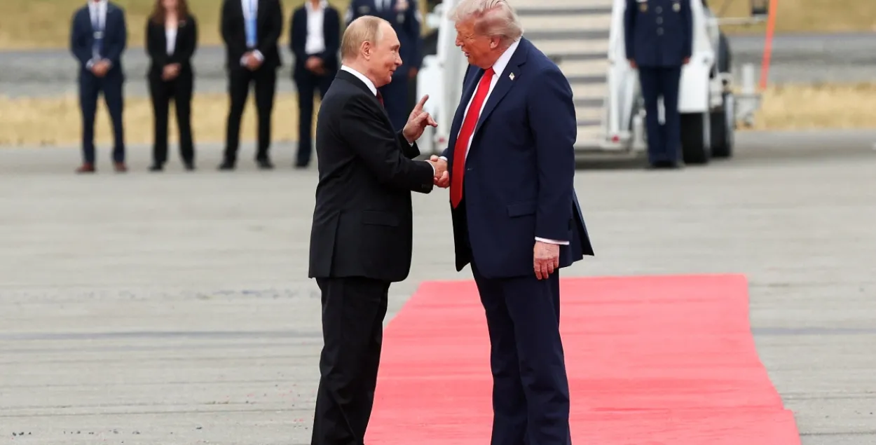 Президент России Владимир Путин и американский лидер Дональд Трамп
