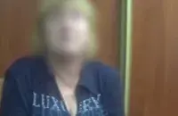 Женщина после задержания / Скриншот с видео​