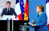 Эмманюэль Макрон и Ангела Меркель / Reuters