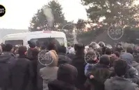 Белорусские силовики стреляют в воздух в лагере мигрантов / кадр из видео