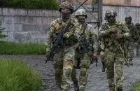 Российские военные на оккупированной территории Украины / AP
