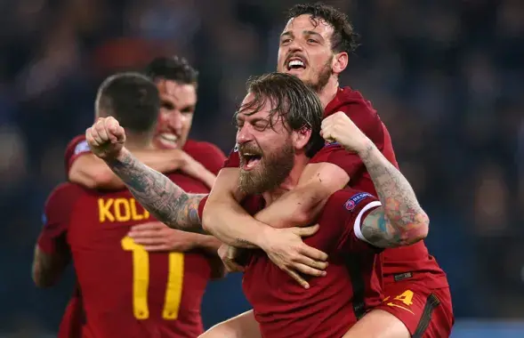 Футболисты &quot;Ромы&quot; празднуют победу. Фото: Reuters