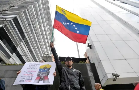 Пратэстуючы ў Каракасе пасля прэзідэнцкіх выбараў​ / Reuters