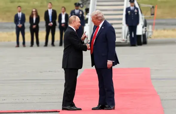 Президент России Владимир Путин и американский лидер Дональд Трамп
