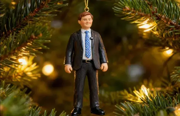 Министр Рыженков в виде игрушки
